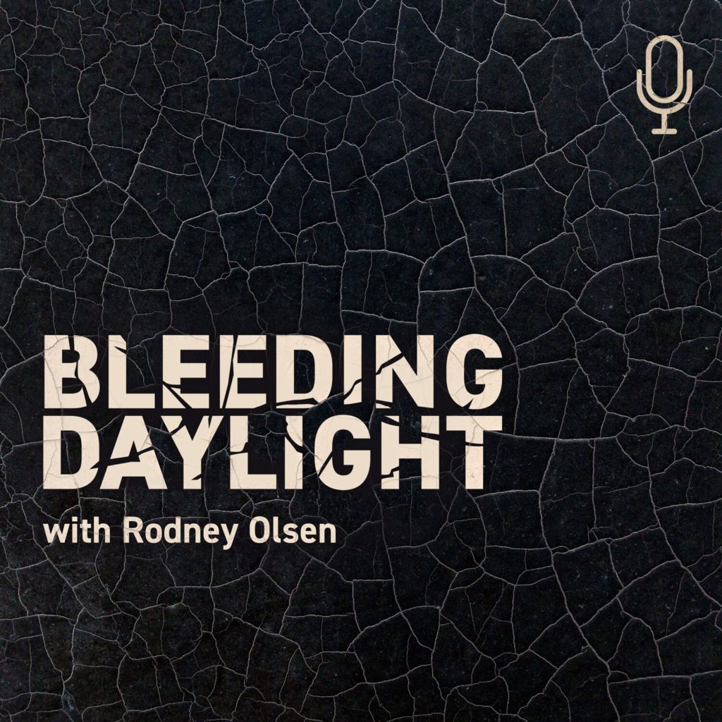 Bleeding Daylight with Rodney Olson Cover Art (Black cracking background, light pink words)