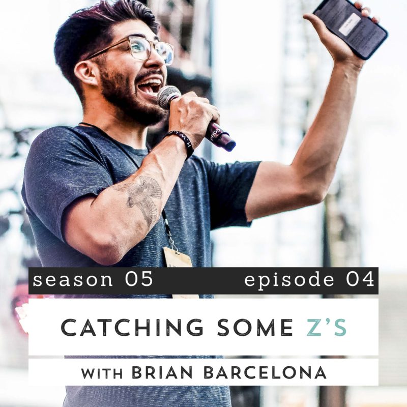 Brian Barcelona speaking into microphone, holding mobile Bible in hand.