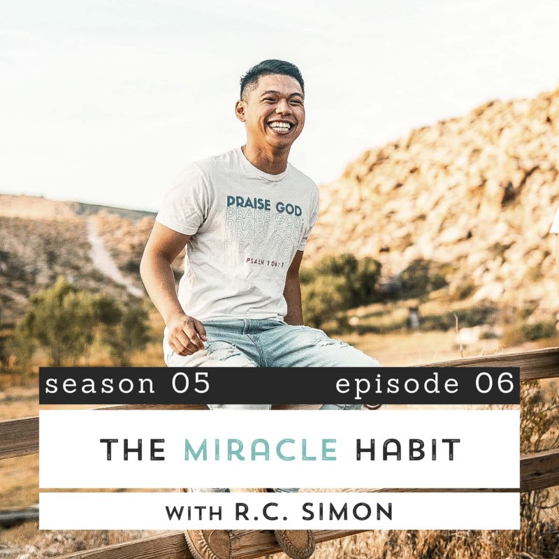 Pastor RC Simon (young man) smiling at camera, sitting on fence in dessert scene. The Miracle Habit with Pastor RC Simon. S05E06.