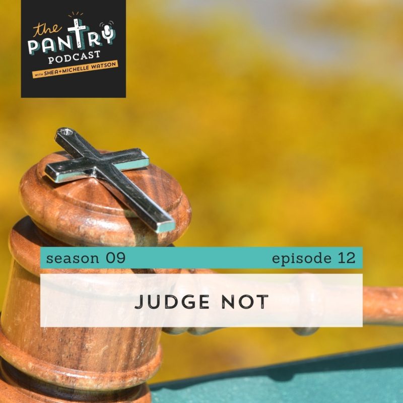How Should Christians Judge if they Judge at all? A wooden gavel with a metal cross sitting on top of it in front of blurred background.